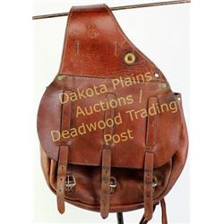 Pair of saddle bags unmarked, made in USA, cavalry style in brown russet, leather showing good condi