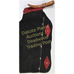 Small childrens batwing chaps stamped on belt Newberry's Alliance, Nebraska, black and red suede wit