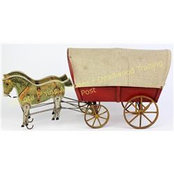 Antique toy wagon and horses made by Gibbs, No. 57 in near fine condition, NO repairs, 18 1/2" long.