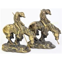 Vintage brass and cast iron "End of the Trail" bookends, based on the original sculpture by C.E. Dal