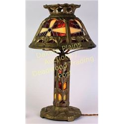 Early stained glass lamp cast iron with art Noveau floral leaf pattern, lights top and bottom, rewir