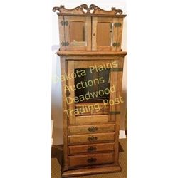Antique tall oak dentist cabinet C. 1900 features fitted and mirrored upper cabinet, center with bev