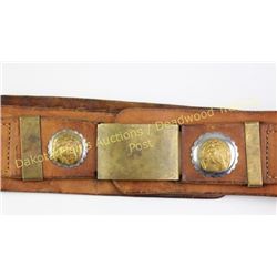 Large well made interesting cartridge belt with brass buckle plate and horse head conchos marked wit