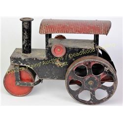 1934 Steelcraft ride on steam roller toy with original paint and graphics, complete including steeri