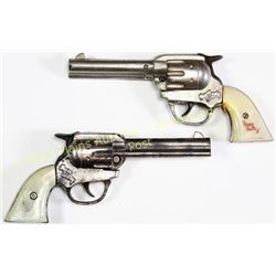 Vintage double holster cap gun set with Gene Autry pistols.  Est. 125-225