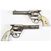 Image 1 : Vintage double holster cap gun set with Gene Autry pistols.  Est. 125-225