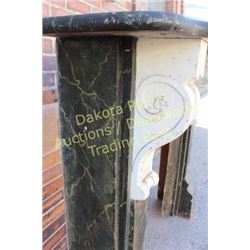 Early Victorian fireplace mantle with original faux painted black marble finish and scrolled corbles