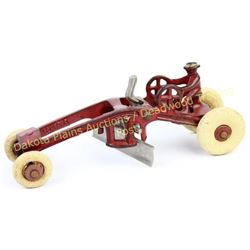 Antique Kenton cast iron road grader with driver complete with original paint, working nickel blade 