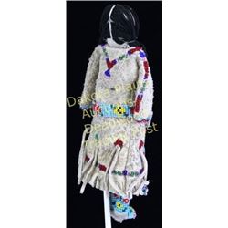 Small beaded Northern Plains Indian childs doll with finely beaded separate belt and pouch, cloth st