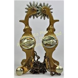 Pair star stamped horse head spurs in bronze, by Beurmann, very good condition.  Est. 150-250