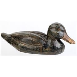 Hand carved and painted wooden decoy similar size to a green winged tail, showing great patina, glas