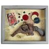 Image 1 : Shadow boxed relic top break revolver displayed with old gambling items.  Est. 75-100