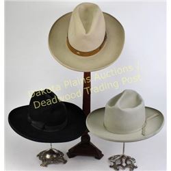 Collection of 3 vintage felt cowboy hats including gray resistol, approximately 7.5", black Montgome