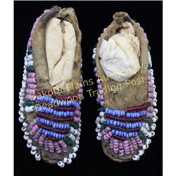 Tiny pair Northern Plains childs toy moccasins 2" long, sinew sewn pink, red, white, green, and blue