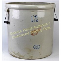 Red Wing marked 12 gallon crock very good condition w/ original wire handles intact.  Est. 100-175