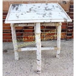 Nicely made birch bark folding table top removable, folding legs and rope accents, top trimmed in sp