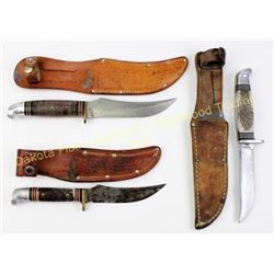 Collection of 3 hunting knives with sheaths.  Est. 25-75