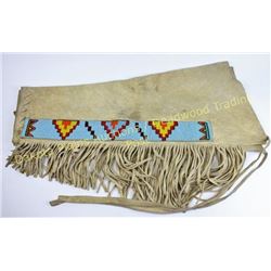 Pair contemporary beaded Plains Indian leggings fringed with bead strips on both legs, 31" long, nic