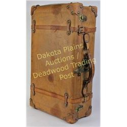 Early leather travel suitcase from Henry Frawley Deadwood S.D. collection, complete with straps and 
