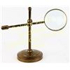 Image 1 : Adjustable magnifying glass solid brass table top style, unmarked, 10" tall.  Est. 100-175