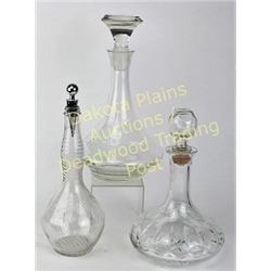 Collection of 3 glass decanters Est.  25-50