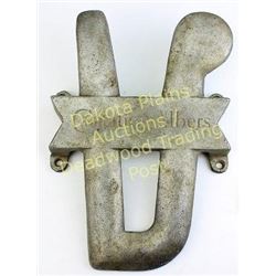 Advertising boot jack for Carnation Albers Co in aluminum, shape of logo, 10" long.  Est. 50-100