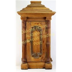 Primitive pine wall cabinet with hinging front door, 27” tall.  Est. 100-175
