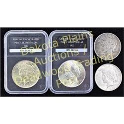 Collection of 5 coins includes 2 slabbed and uncirculated silver peace dollars 1922 and 1924, ungrad