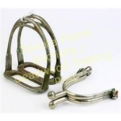 Collection of 2 includes nickel steel officers spurs and star stamped Buermann stirrups.  Est. 125-2