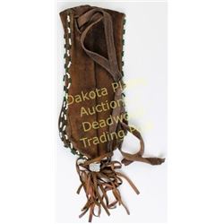 Leather beaded drawstring bag with classic rolling log symbol, light wear at throat, otherwise very 
