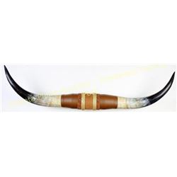 Pair mounted contemporary steer horns 42" tip to tip.  Est. 25-75