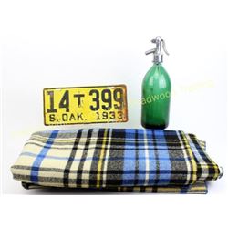 Collection of 3 includes 1933 South Dakota license plate, green glass seltzer bottle, and an L.L. Be