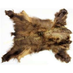 Small tanned bear skin 38” long, very good condition.  Est. 100-175