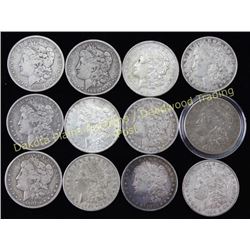 Collection of 12 Morgan silver dollars Est. 200-300
