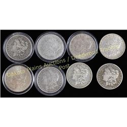 Collection of 8 Morgan silver dollars Est. 150-200