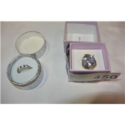 TWO STERLING DINNER RINGS