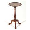 Image 1 : Circular mahogany inlaid wine table on tri…