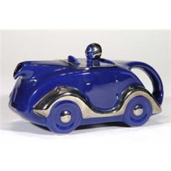 Dark blue glazed and chrome Sadler Art Dec…