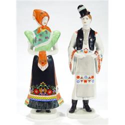 Pair of Hungarian porcelain figures in tra…