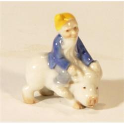 Hand painted Wade leprechaun on pig's back…