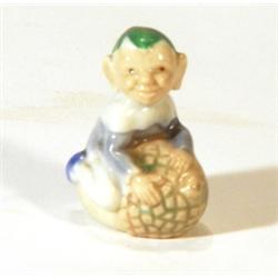 Hand painted Wade leprechaun on an acorn, …