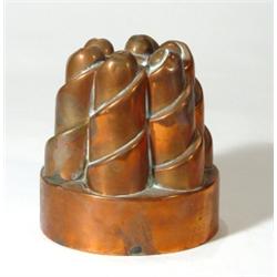 Circular based copper jelly mould with twi…