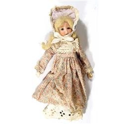 Bisque headed West German doll with open m…