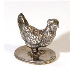 Small silver chicken on an oval base, 5cm …