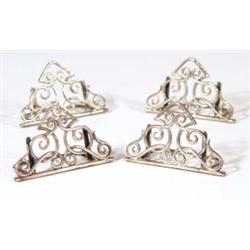 Set of four silver scroll design folding m…