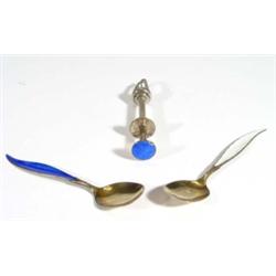 Two Sterling silver and enamel spoons with…