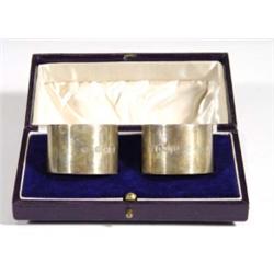 Cased pair of silver napkin rings, London …