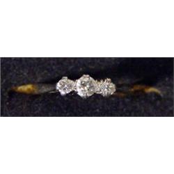 18ct gold and platinum three stone diamond…