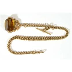 9ct gold Albert chain with amber gilt meta…