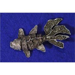 Silver and articulate koi carp brooch…